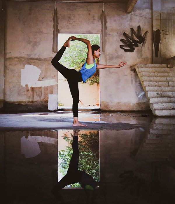 Woman performing a light cardio exercise in a calm environment.